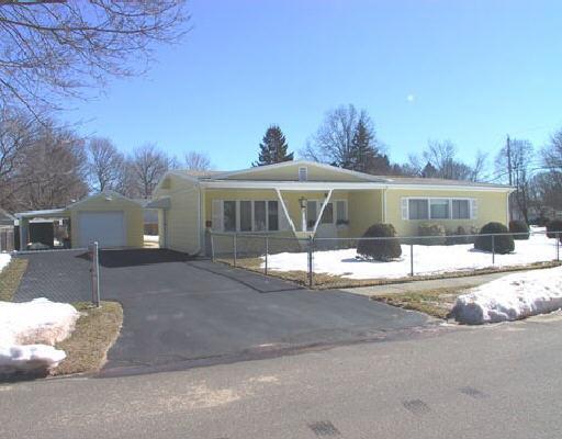 116 Bear Paw Road Bridgeport, CT 06606 - Photo 1 of 1 a front view of a house with a yard