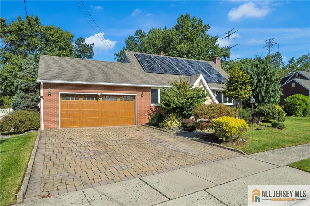 5 Montview Road Edison, NJ 08837 - Photo 2 of 47 a front view of a house with a yard and potted plants
