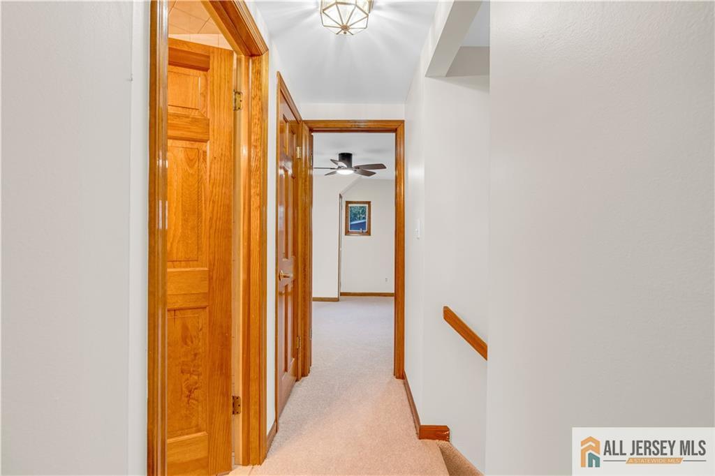 5 Montview Road Edison, NJ 08837 - Photo 27 of 47 a view of a hallway with wooden floor
