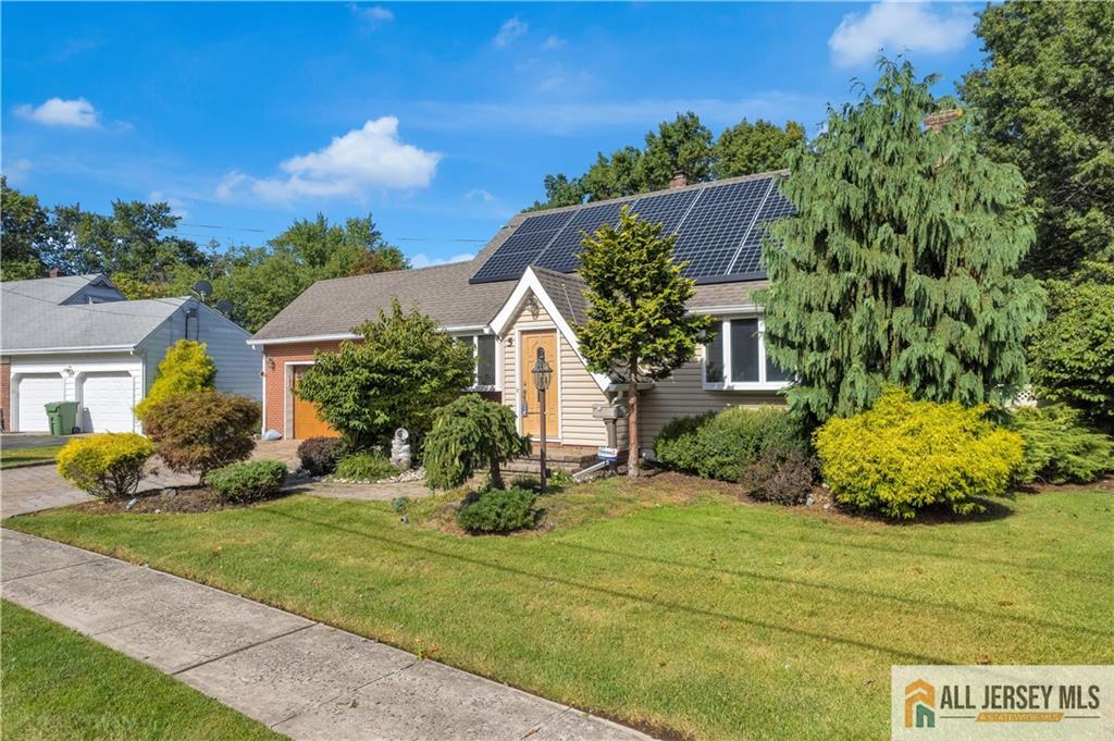 5 Montview Road Edison, NJ 08837 - Photo 3 of 47 a front view of a house with a yard