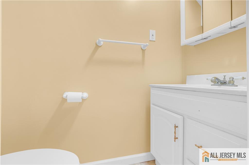 5 Montview Road Edison, NJ 08837 - Photo 37 of 47 a bathroom with a sink a toilet and shower