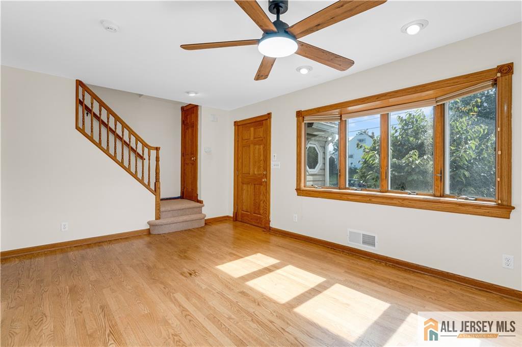 5 Montview Road Edison, NJ 08837 - Photo 4 of 47 wooden floor in an empty room with a window