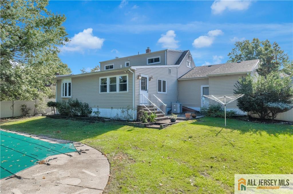 5 Montview Road Edison, NJ 08837 - Photo 41 of 47 a view of a house with swimming pool and a yard