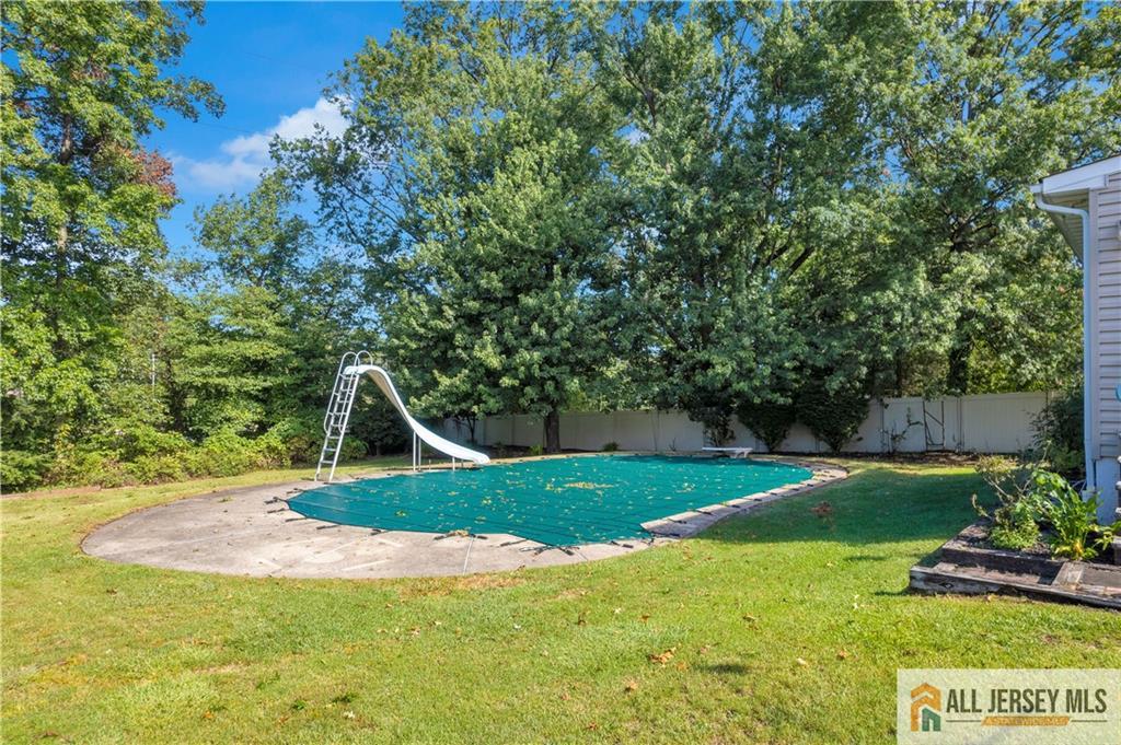 5 Montview Road Edison, NJ 08837 - Photo 42 of 47 a view of a backyard with large trees