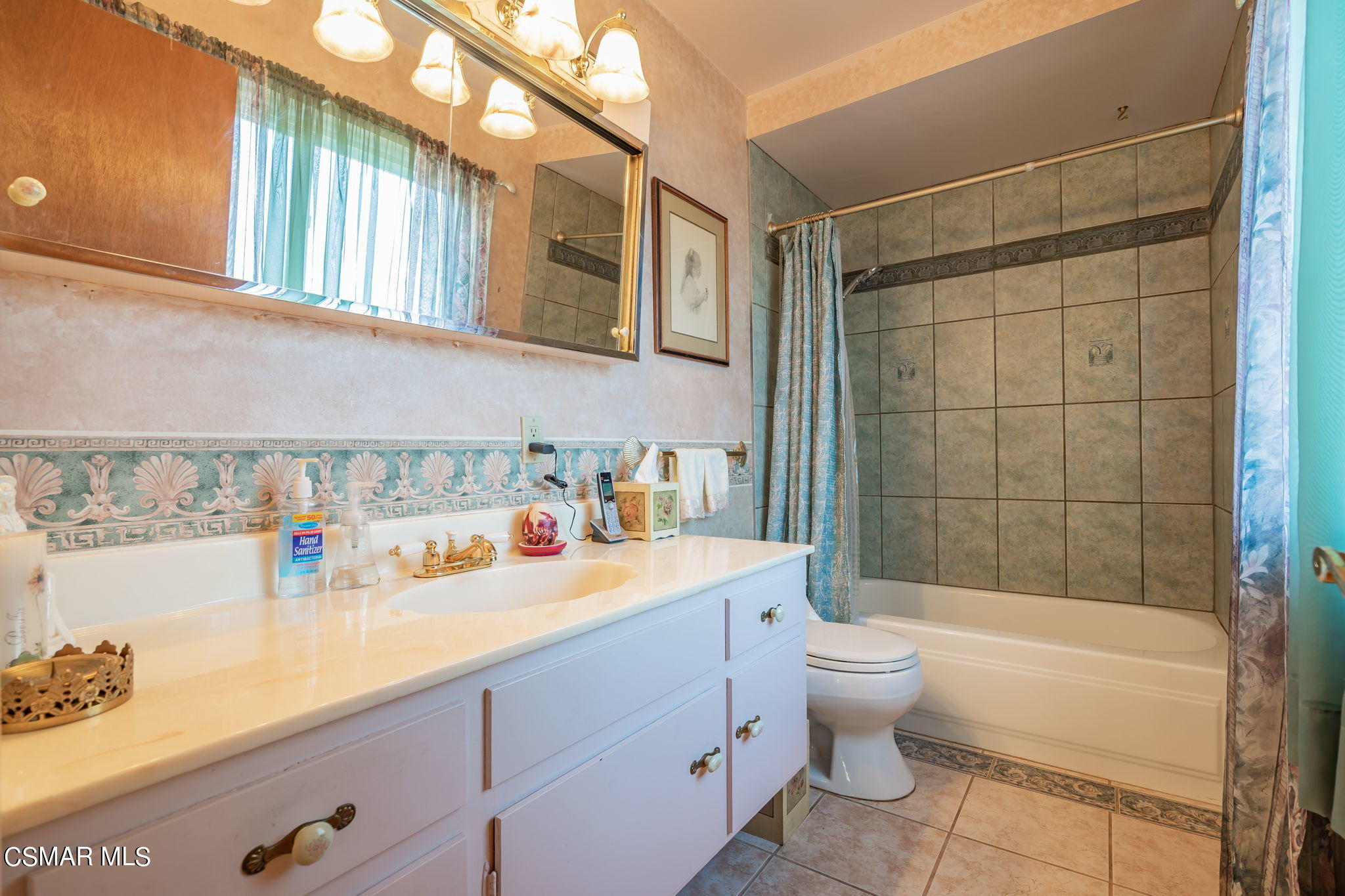 3004 Fitzgerald Road Simi Valley, CA 93065 - Photo 14 of 35 a bathroom with a sink mirror toilet and bathtub