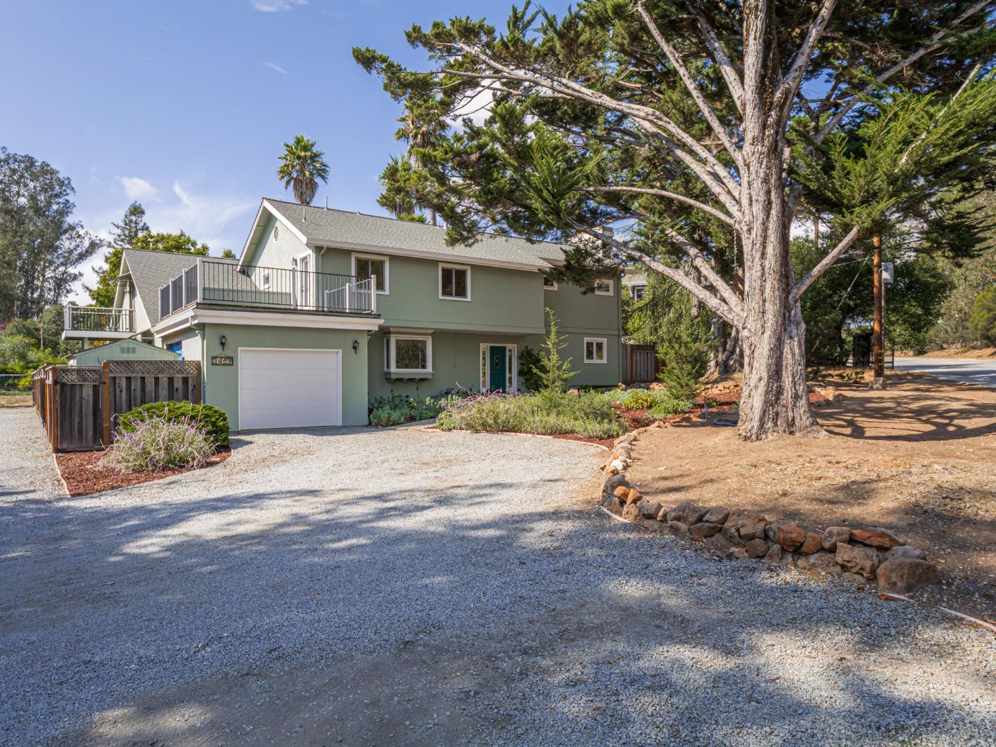 1459 High Street Santa Cruz, CA 95060 - Photo 2 of 62 a view of a white house with a large tree s