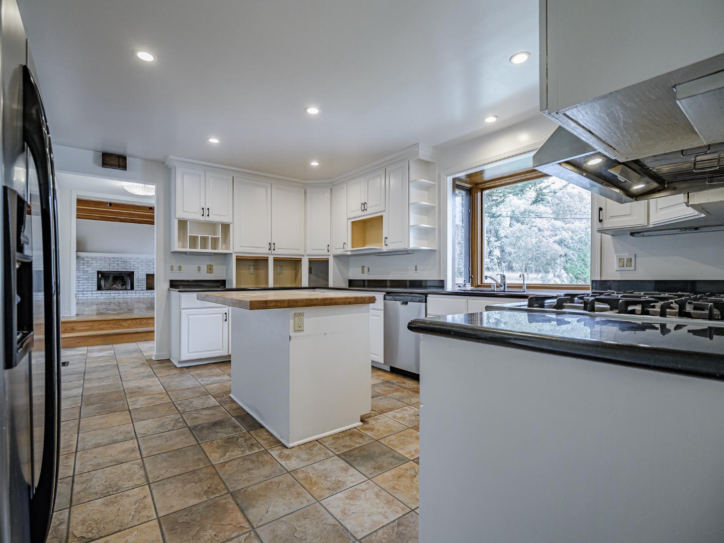 1459 High Street Santa Cruz, CA 95060 - Photo 4 of 62 a kitchen with stainless steel appliances granite countertop a stove a sink and a refrigerator