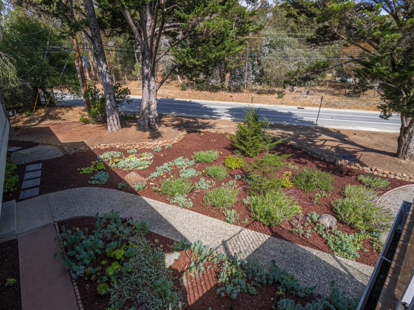 1459 High Street Santa Cruz, CA 95060 - Photo 42 of 62 a view of a yard with wooden fence