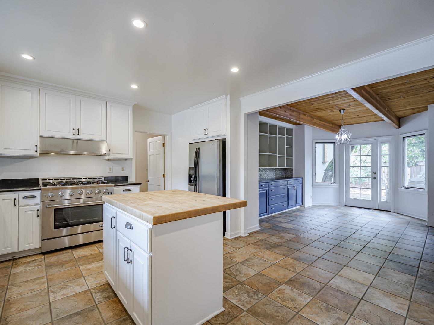 1459 High Street Santa Cruz, CA 95060 - Photo 8 of 62 a kitchen with stainless steel appliances granite countertop a stove a sink and a refrigerator
