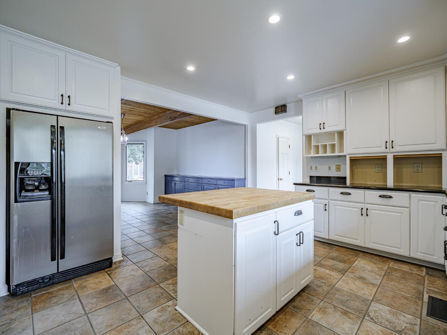 1459 High Street Santa Cruz, CA 95060 - Photo 10 of 62 a kitchen with granite countertop a stove oven and refrigerator