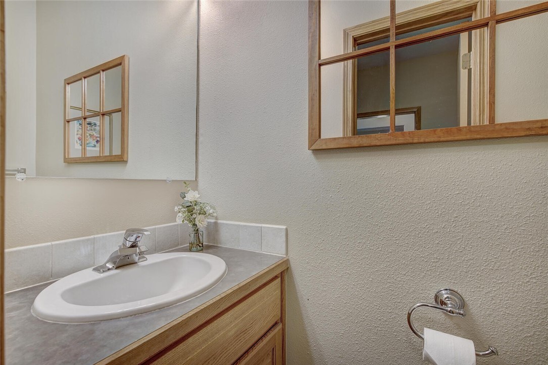 591 Ryan Gulch Road Silverthorne, CO 80498 - Photo 14 of 34 Main floor powder bathroom is adjacent to the laundry room.