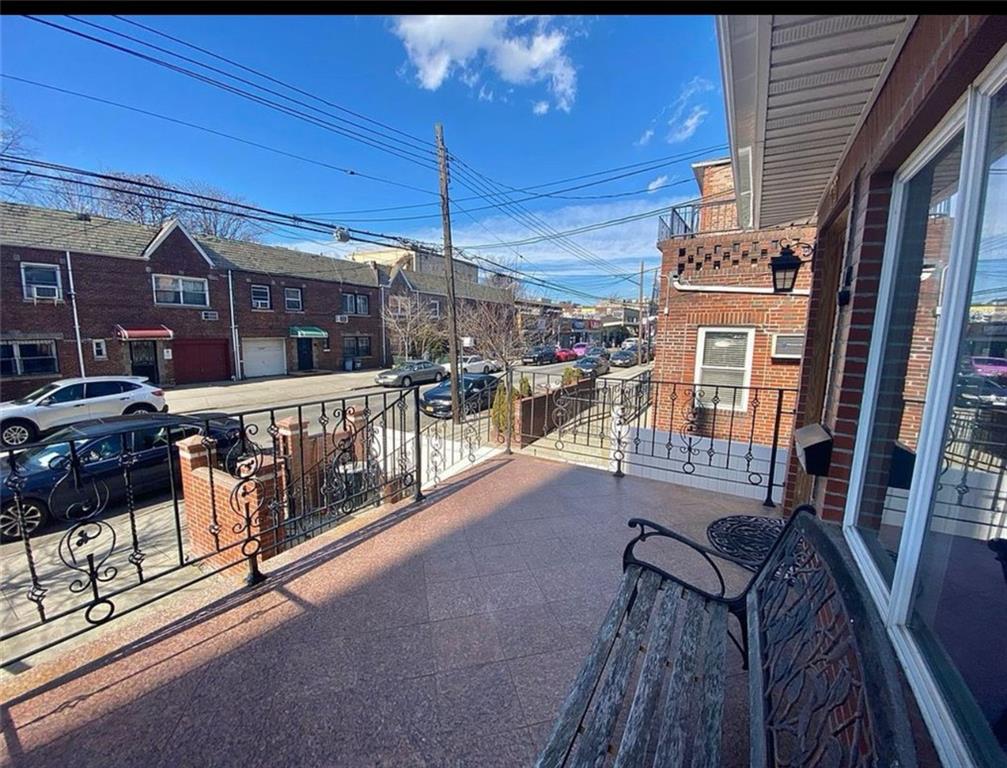 1727 East 16th Street Brooklyn, NY 11229 - Photo 4 of 35 a view of a patio with table and chairs