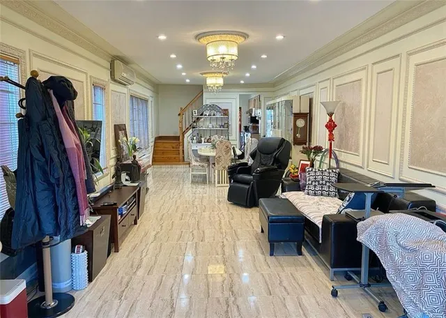 a large kitchen with a table and chairs