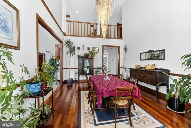 a living room with furniture rug and window
