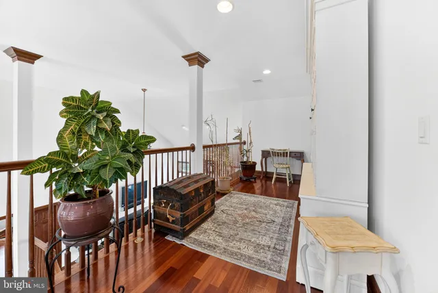 a room with furniture and air hockey table
