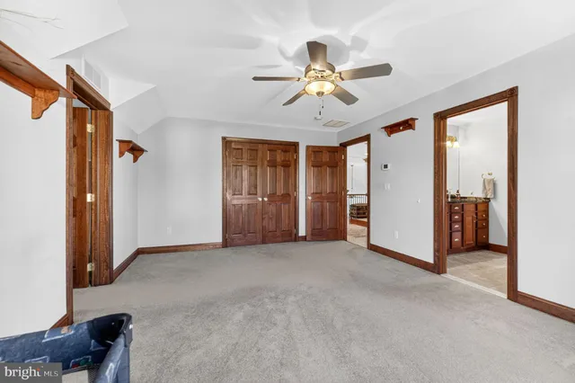 a view of a patio with a table and chairs