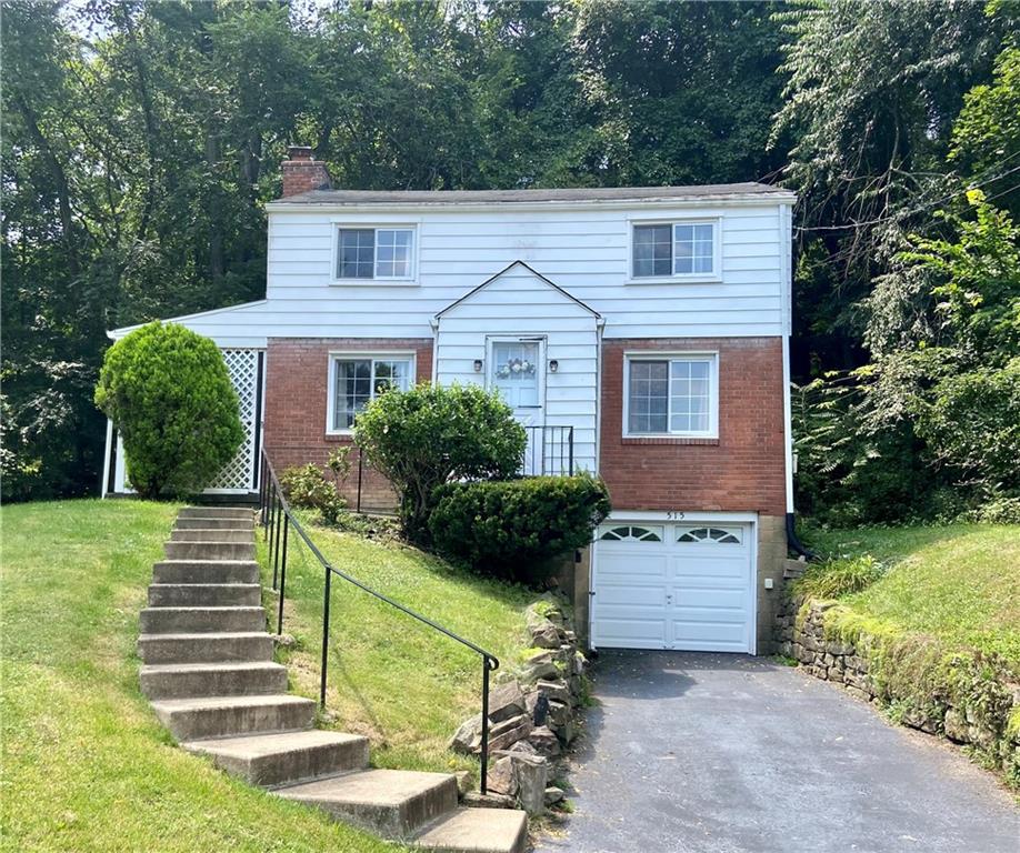 515 Filmore Road Pittsburgh, PA 15221 - Photo 1 of 14 front view of a house with a yard