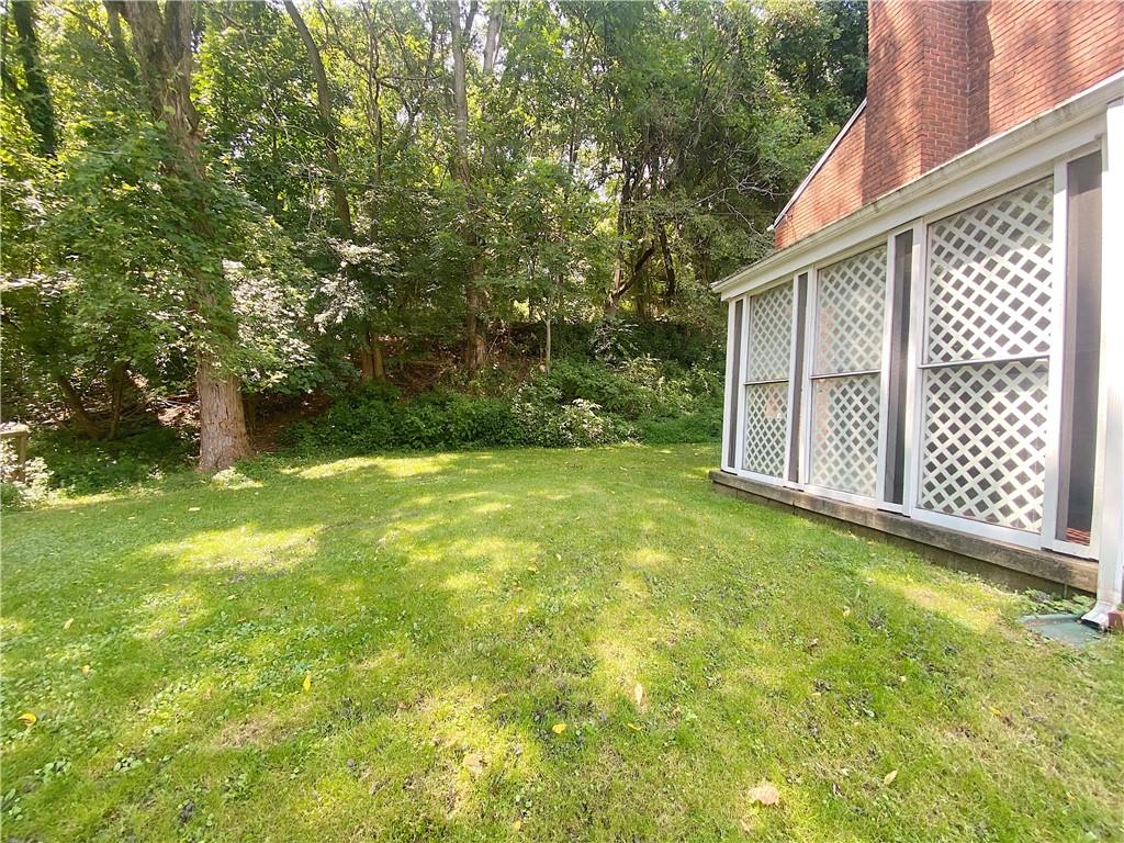 515 Filmore Road Pittsburgh, PA 15221 - Photo 13 of 14 a view of a back yard of the house