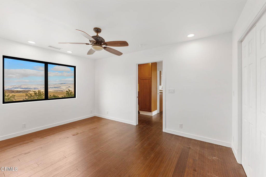2170 Aliso Park Road Maricopa, CA 93252 - Photo 32 of 72 wooden floor in an empty room with a window