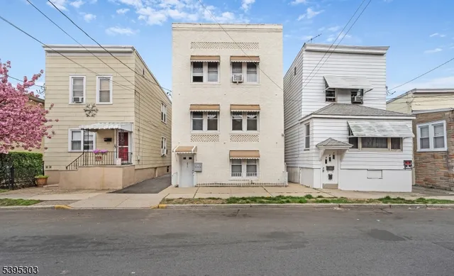 front view of a house with a street