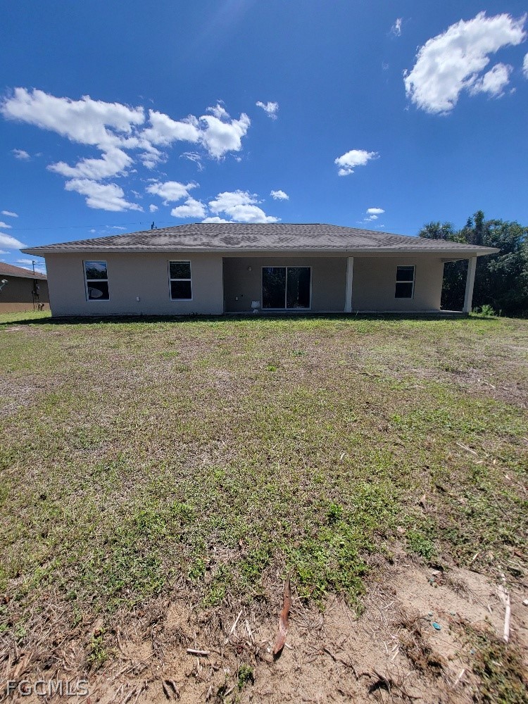 355 Paddock Street Lehigh Acres, FL 33974 - Photo 29 of 29 a outdoor space with the view of a building