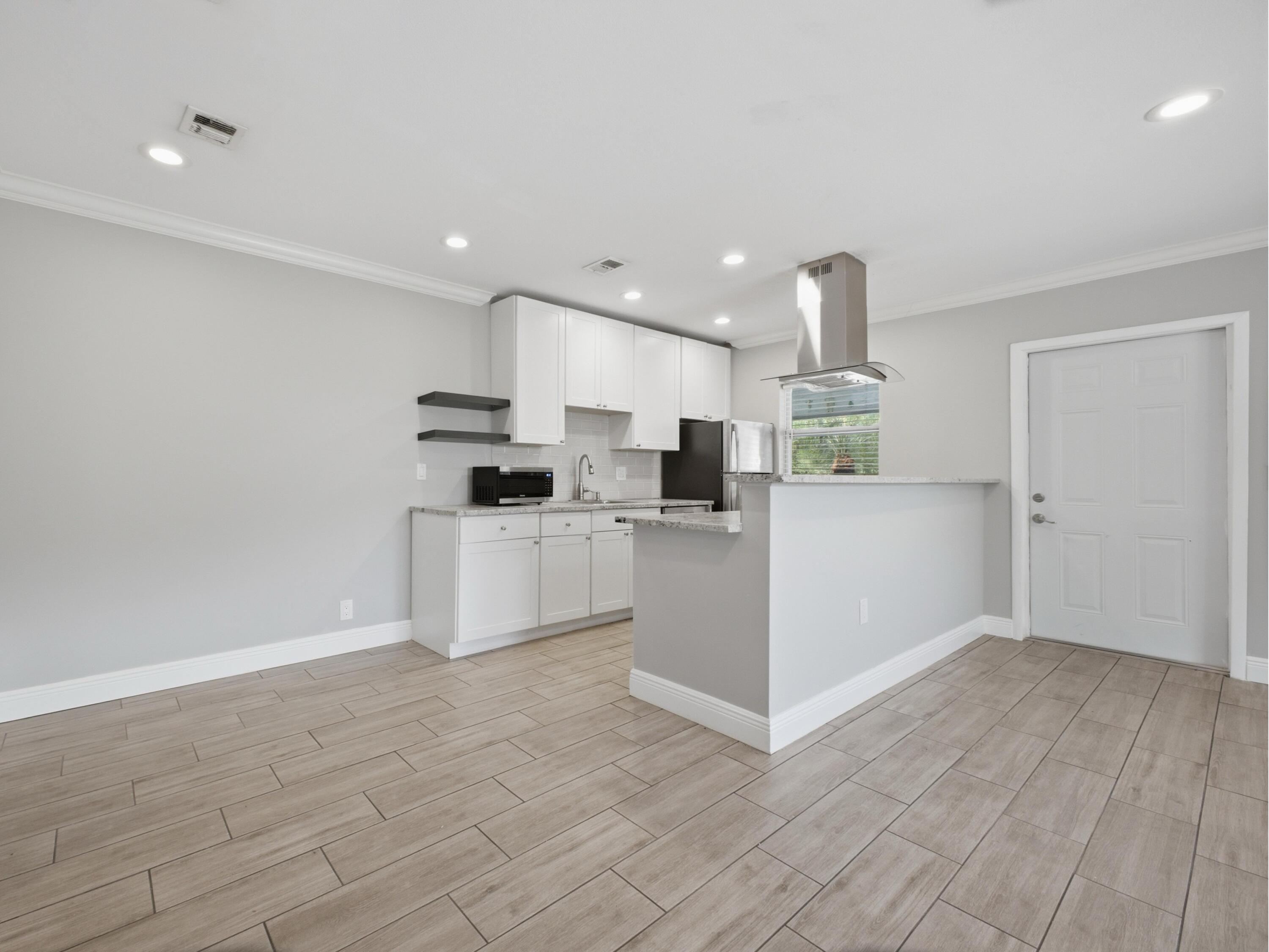 3125 Albatross Road Delray Beach, FL 33444 - Photo 9 of 26 A Dining Kitchen 1