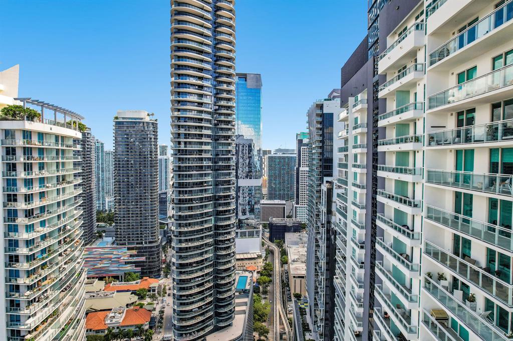 1050 Brickell Avenue, Unit 2302 Miami, FL 33131 - Photo 48 of 50 a city view with tall buildings