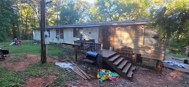 a view of a patio filled with furniture