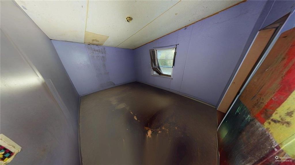 401 Towaliga Trail Forsyth, GA 31029 - Photo 17 of 29 a view of a hallway with a window