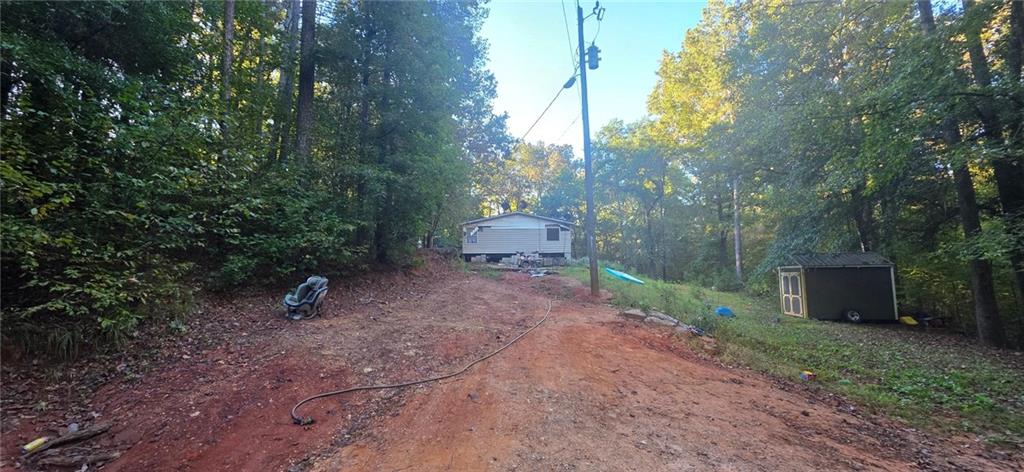 401 Towaliga Trail Forsyth, GA 31029 - Photo 19 of 29 a view of a outdoor space and a yard