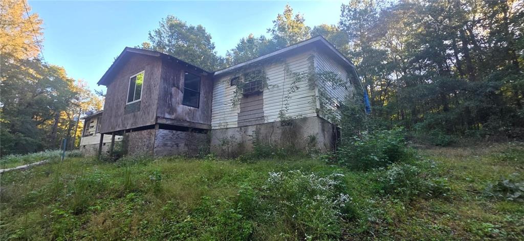 401 Towaliga Trail Forsyth, GA 31029 - Photo 23 of 29 a view of a house with a yard
