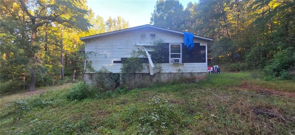 401 Towaliga Trail Forsyth, GA 31029 - Photo 24 of 29 a view of front of a house with a yard