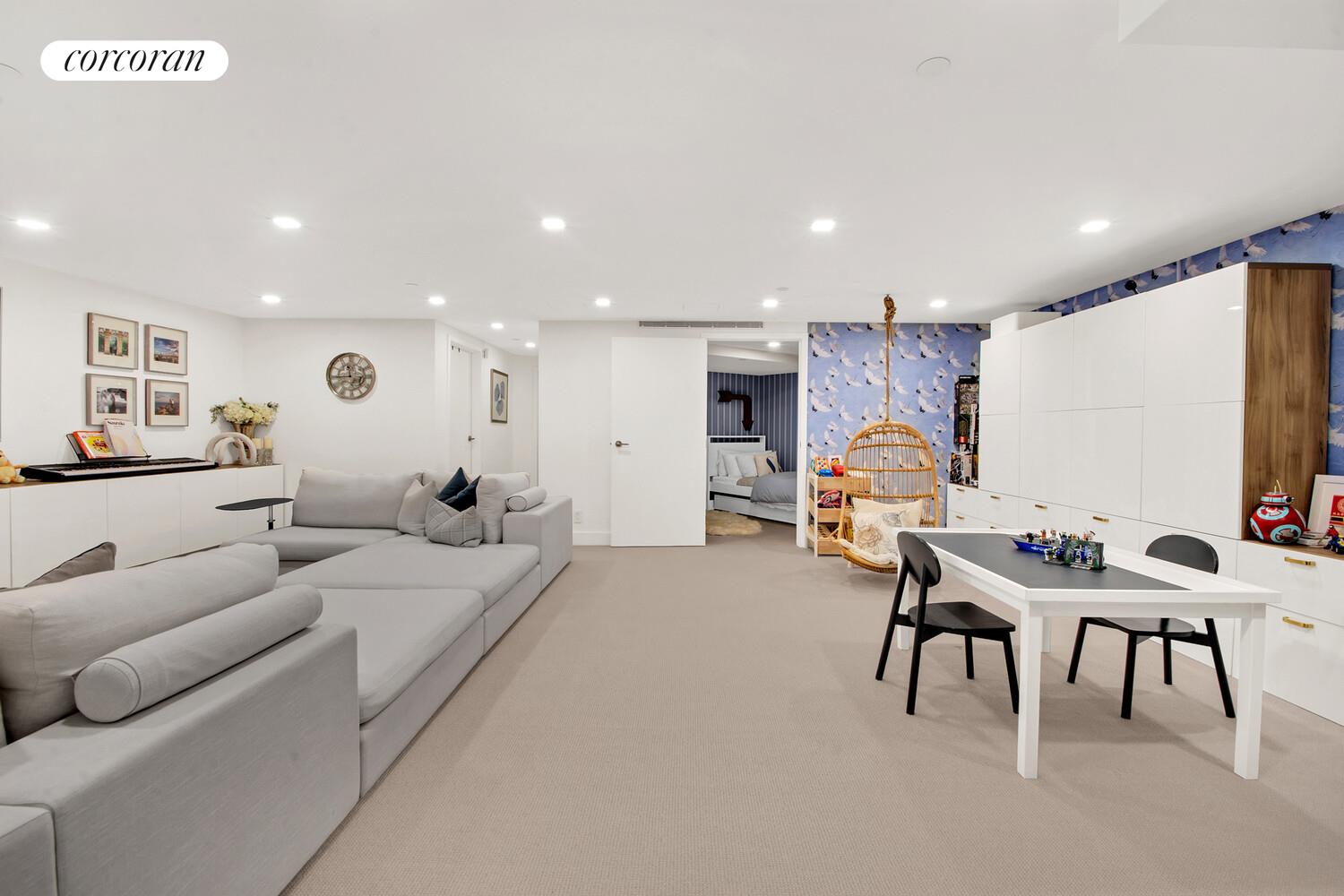 471 Washington Street, Unit THC Manhattan, NY 10013 - Photo 10 of 15 a living room with furniture and a large window