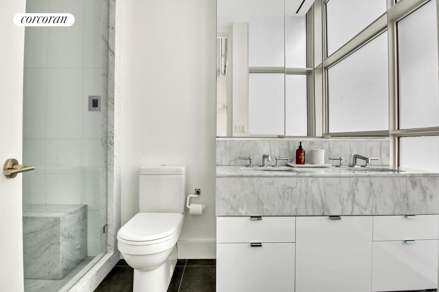 471 Washington Street, Unit THC Manhattan, NY 10013 - Photo 12 of 15 a bathroom with a sink and a toilet