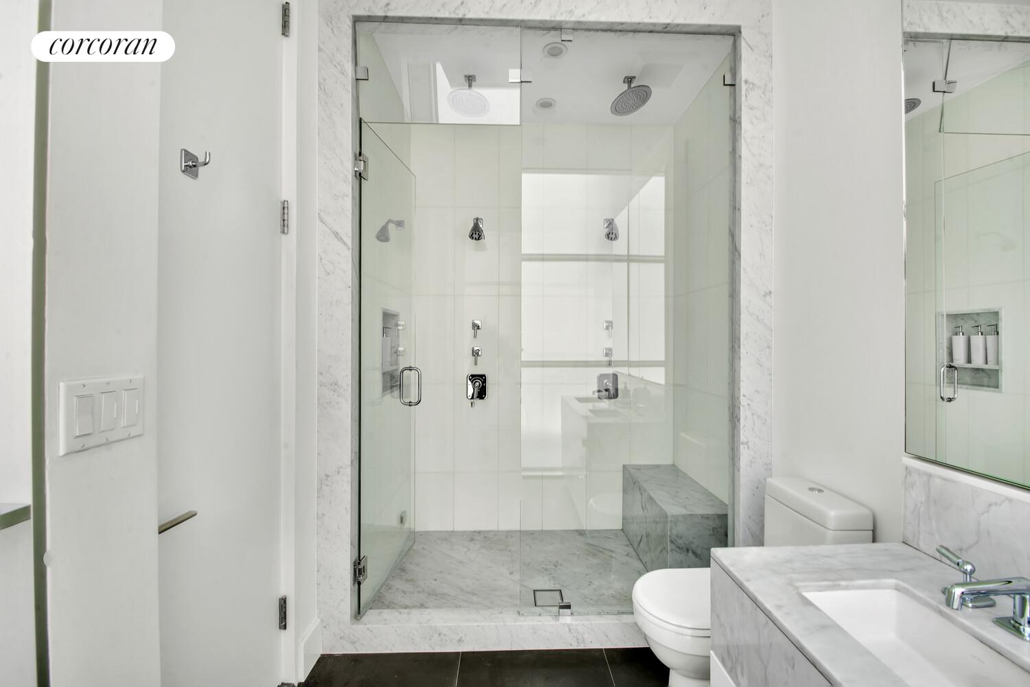 471 Washington Street, Unit THC Manhattan, NY 10013 - Photo 13 of 15 a bathroom with a granite countertop sink a toilet and shower