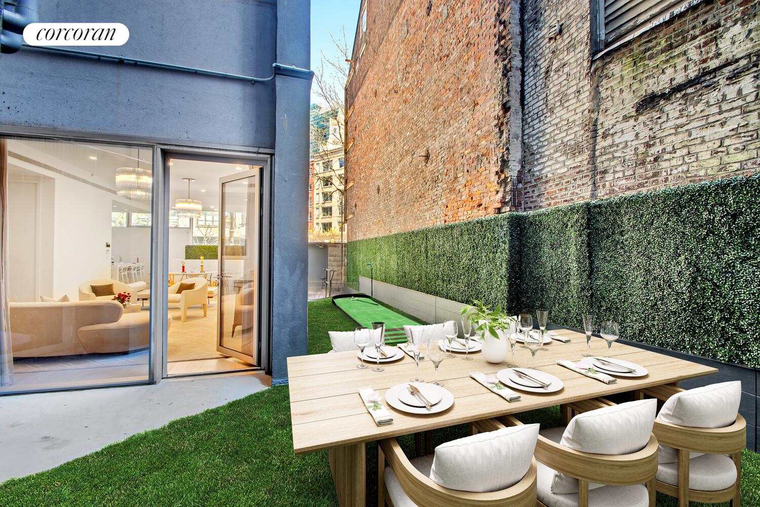 471 Washington Street, Unit THC Manhattan, NY 10013 - Photo 4 of 15 a outdoor dining space with furniture and garden view