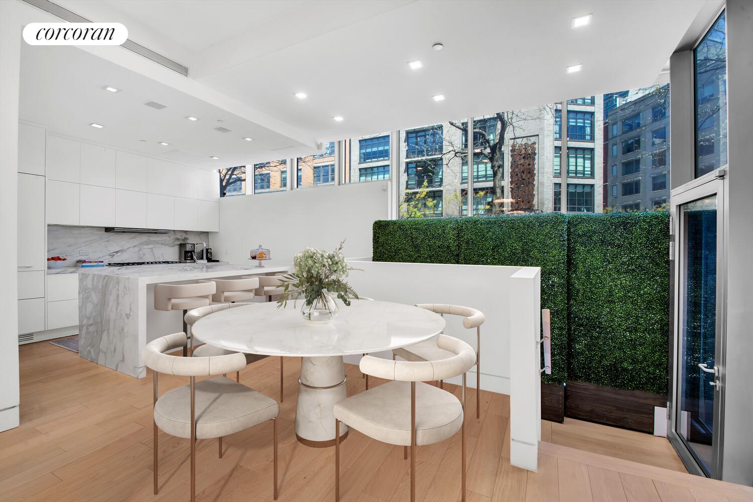 471 Washington Street, Unit THC Manhattan, NY 10013 - Photo 5 of 15 a view of kitchen with kitchen island dining table and chairs
