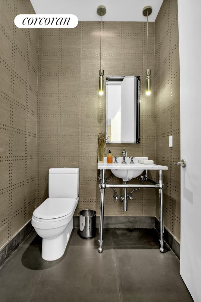 471 Washington Street, Unit THC Manhattan, NY 10013 - Photo 7 of 15 a bathroom with a sink and a toilet