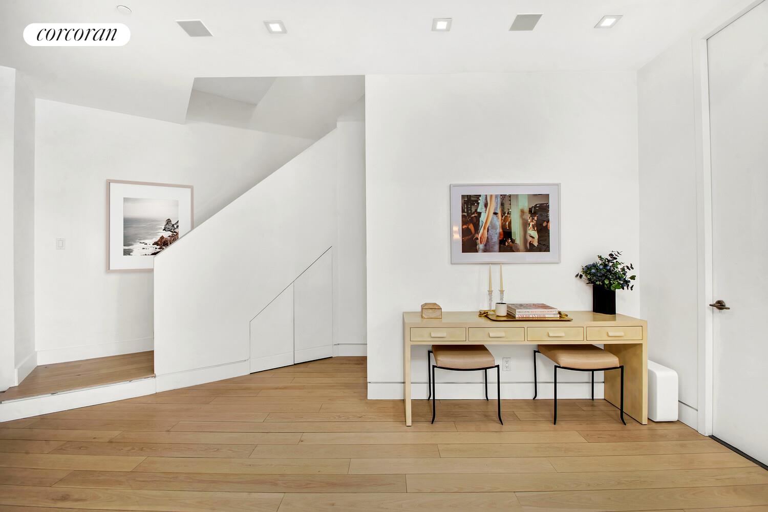 471 Washington Street, Unit THC Manhattan, NY 10013 - Photo 8 of 15 a view of a workspace with furniture