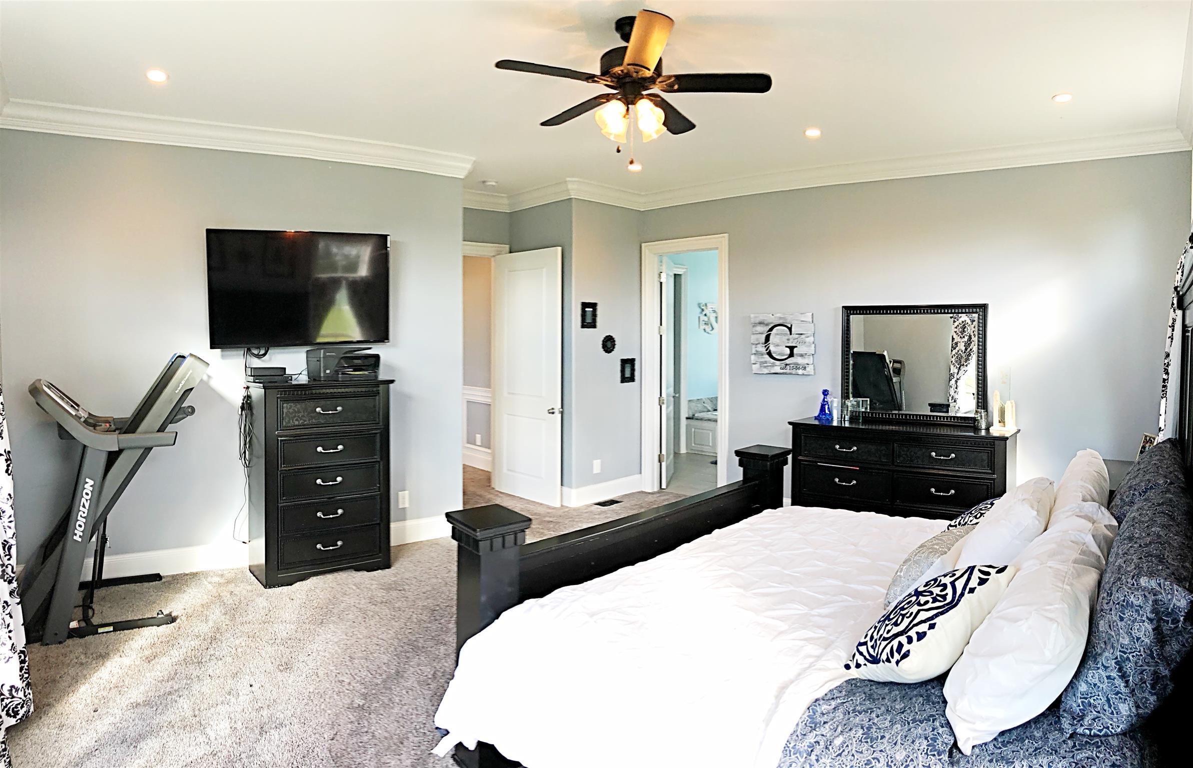 3379 Maxie Jones Road Springfield, TN 37172 - Photo 19 of 30 a bedroom with a bed and a flat screen tv