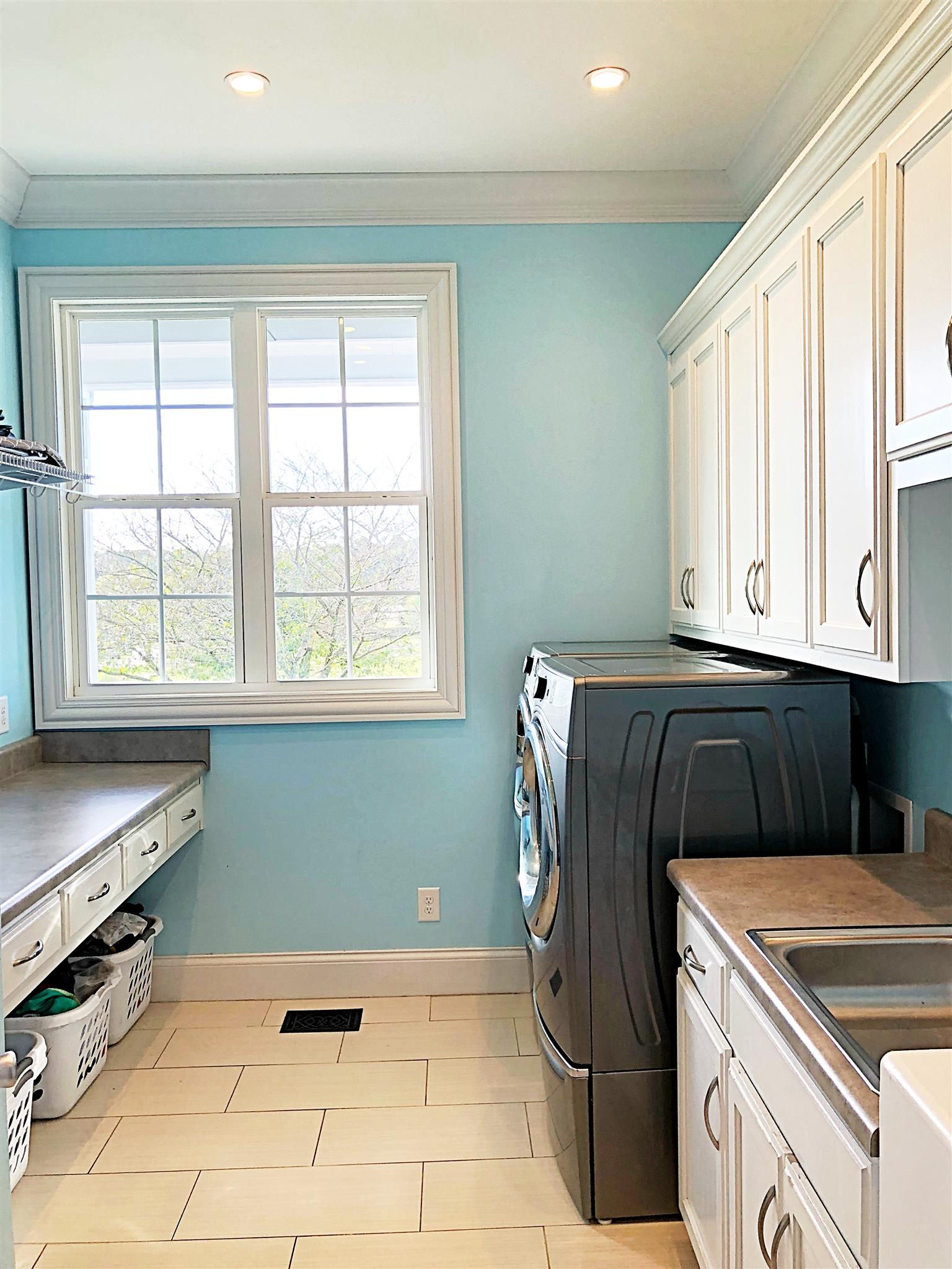 3379 Maxie Jones Road Springfield, TN 37172 - Photo 23 of 30 a kitchen with a refrigerator and a sink