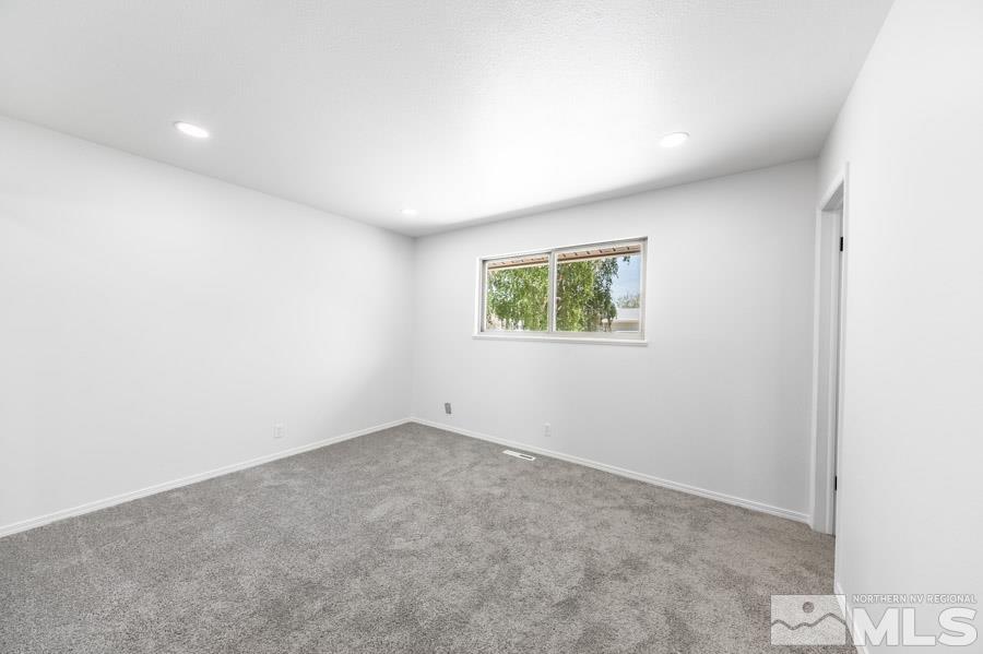 2441 Baxter Way Sparks, NV 89431 - Photo 12 of 25 an empty room with a window