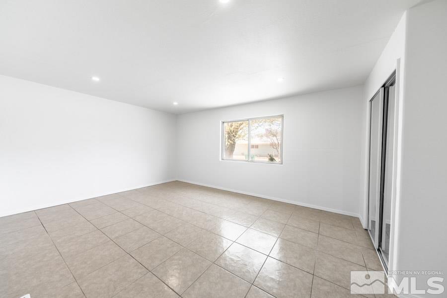 2441 Baxter Way Sparks, NV 89431 - Photo 15 of 25 an empty room with windows