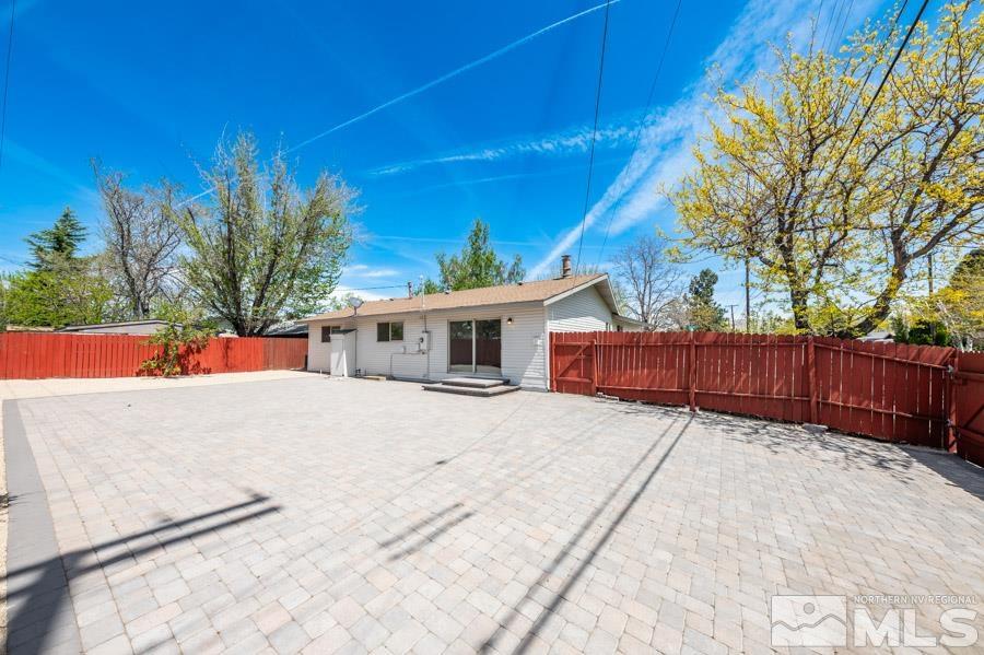 2441 Baxter Way Sparks, NV 89431 - Photo 20 of 25 a front view of a house with a yard