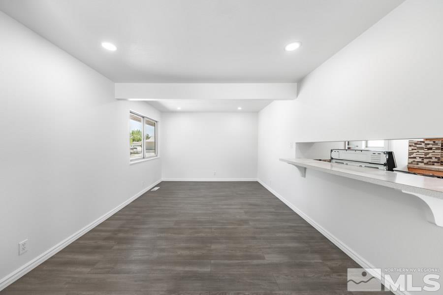 2441 Baxter Way Sparks, NV 89431 - Photo 6 of 25 a view of a kitchen with wooden floor and a sink