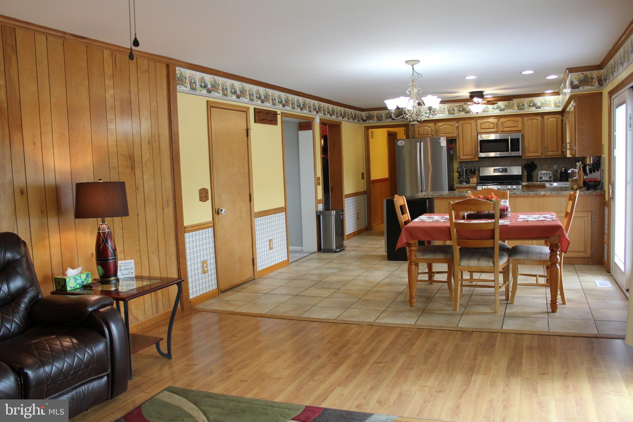 294 Starr Road Landenberg, PA 19350 - Photo 18 of 68 a view of a dining room with furniture and chandelier
