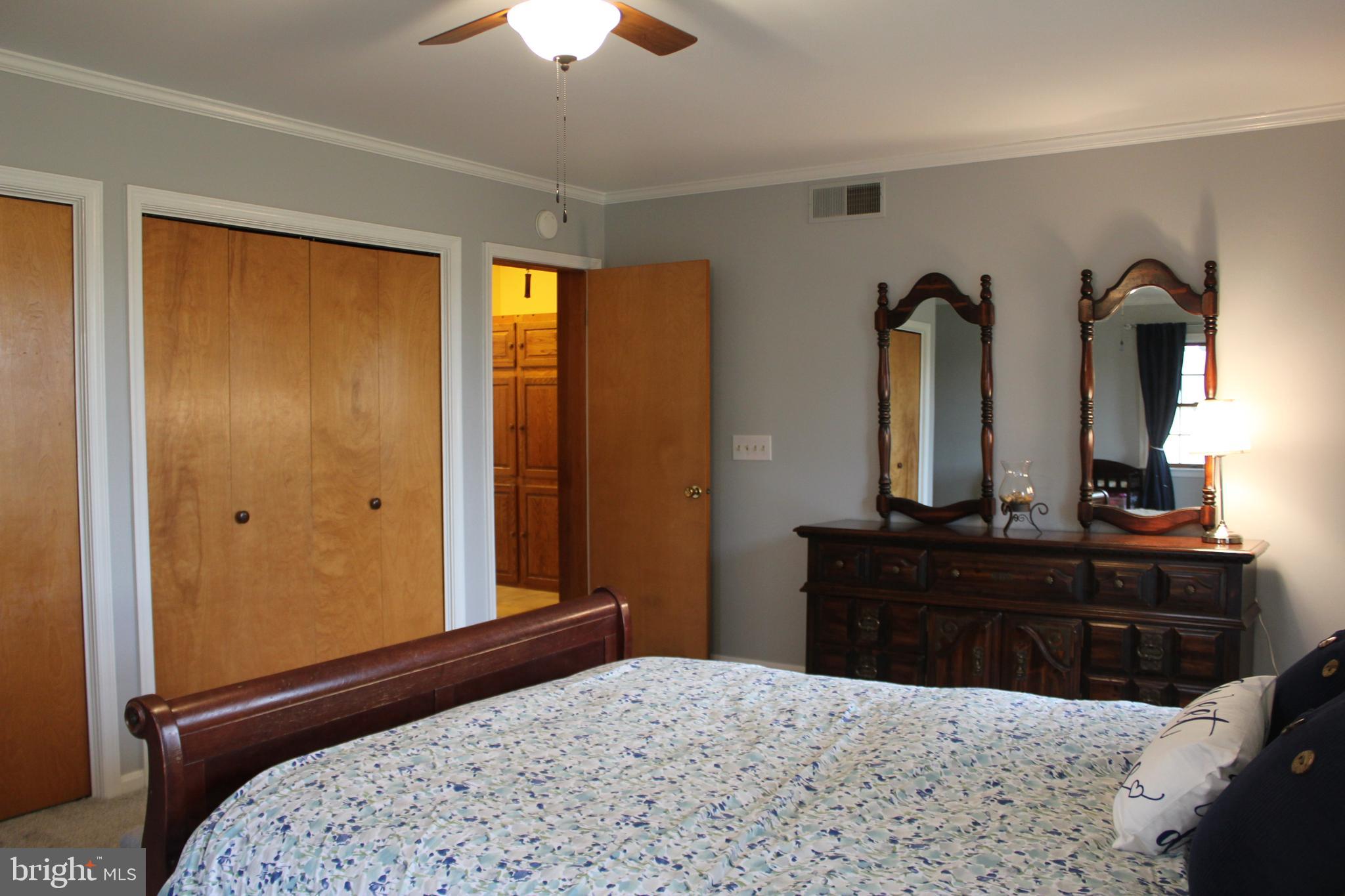 294 Starr Road Landenberg, PA 19350 - Photo 25 of 68 a bedroom with a bed and a dresser
