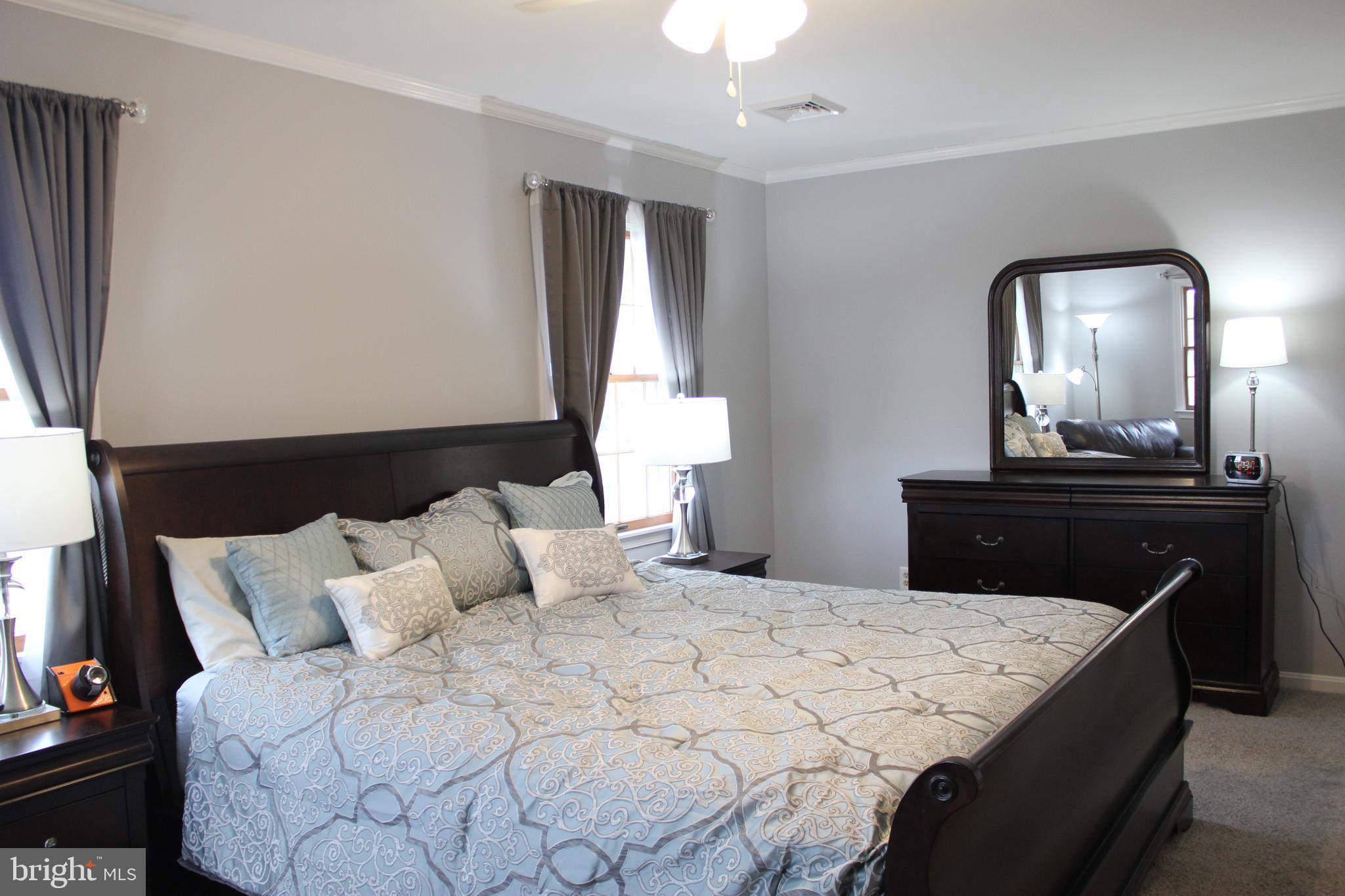 294 Starr Road Landenberg, PA 19350 - Photo 30 of 68 a bedroom with a bed and a dresser