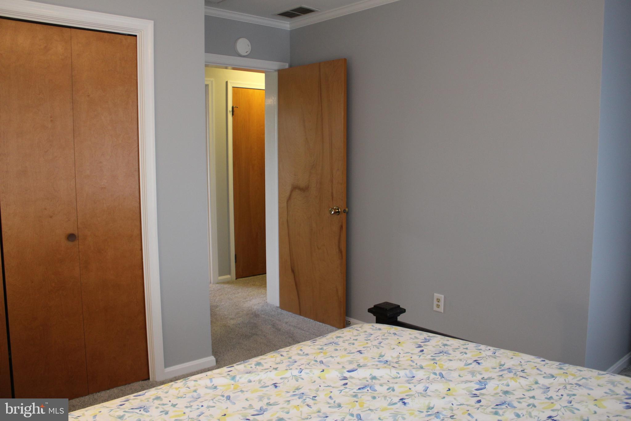 294 Starr Road Landenberg, PA 19350 - Photo 39 of 68 a bedroom with a bed and wooden floor