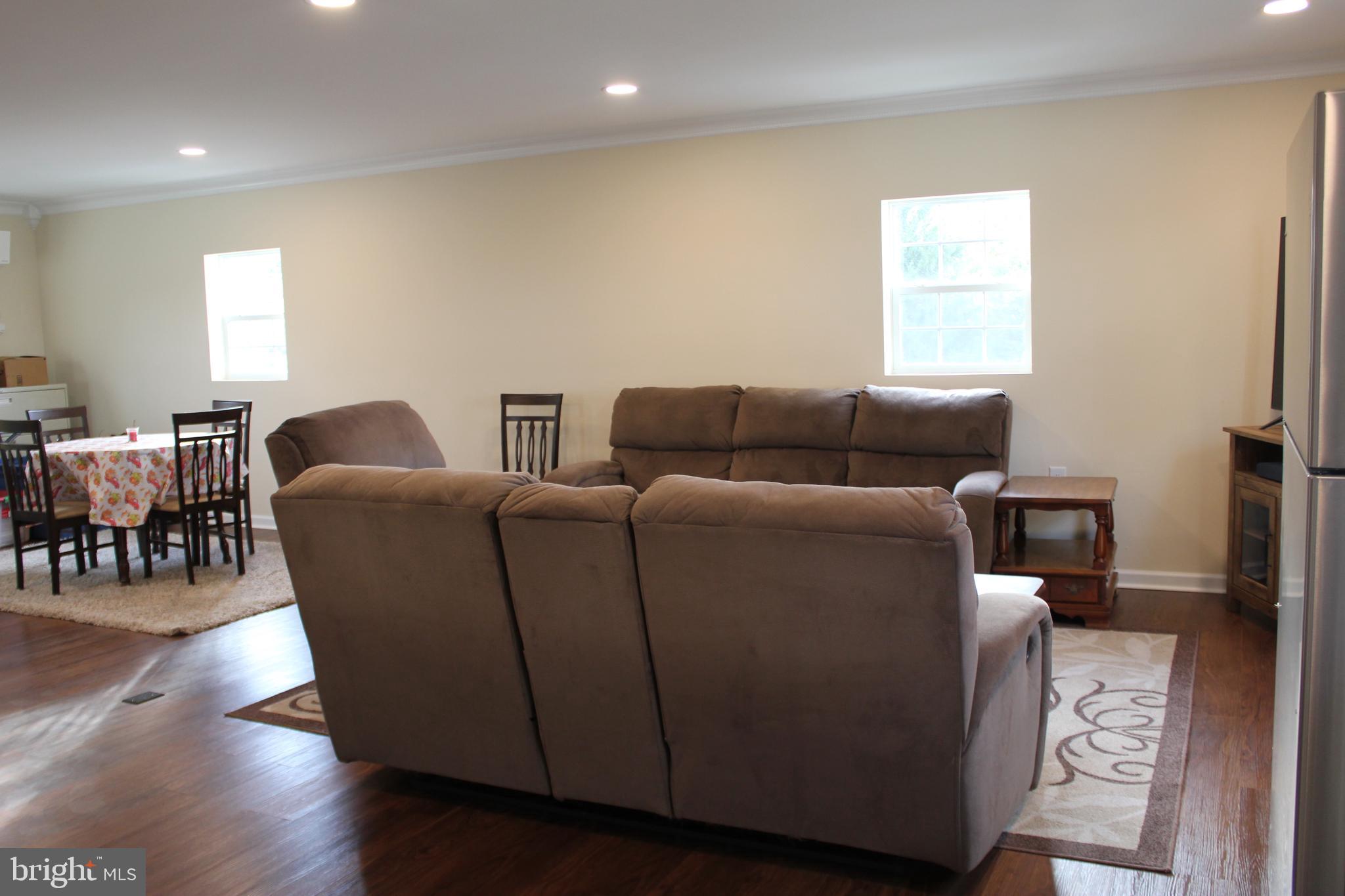 294 Starr Road Landenberg, PA 19350 - Photo 53 of 68 a living room with furniture and a window